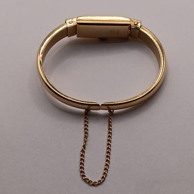 LOT 36: Geneve 750 18K Yellow Gold Hinged Bracelet Watch w/ Safety Chain 15.2gtw