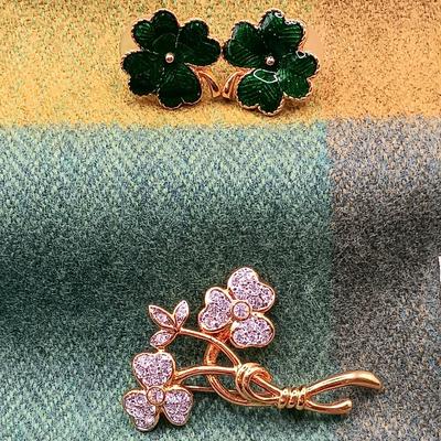 LOT 52: Collection of Irish Inspired Fashion Items Including (1) 12K Rolled Gold and (1) Silver Connemara Marble Brooches
