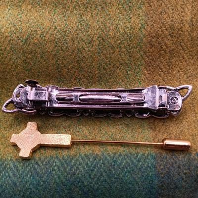 LOT 52: Collection of Irish Inspired Fashion Items Including (1) 12K Rolled Gold and (1) Silver Connemara Marble Brooches