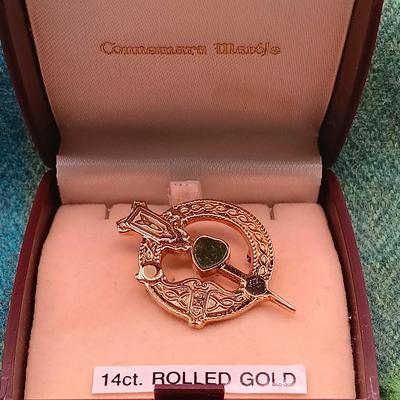 LOT 52: Collection of Irish Inspired Fashion Items Including (1) 12K Rolled Gold and (1) Silver Connemara Marble Brooches