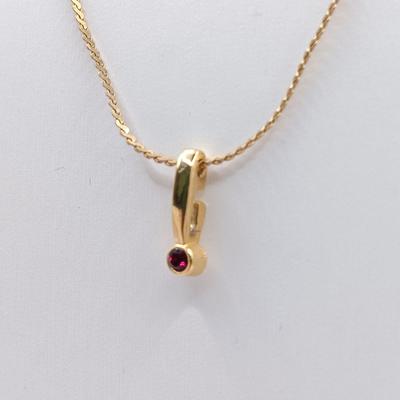 LOT 246: Collection of Faux Garnet and Gold-Tone Fashion Jewelry