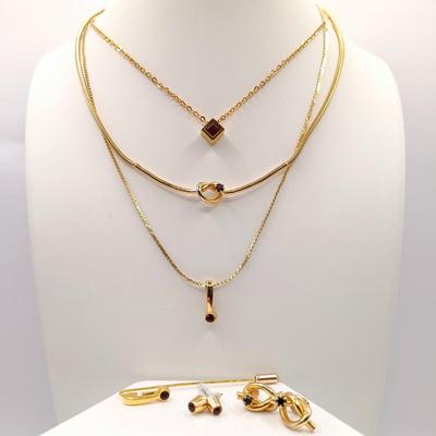 LOT 246: Collection of Faux Garnet and Gold-Tone Fashion Jewelry