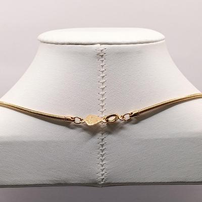 LOT 246: Collection of Faux Garnet and Gold-Tone Fashion Jewelry