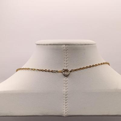 LOT 246: Collection of Faux Garnet and Gold-Tone Fashion Jewelry