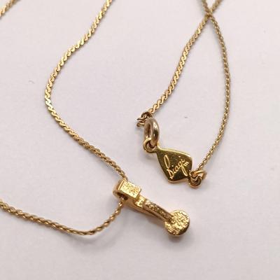 LOT 246: Collection of Faux Garnet and Gold-Tone Fashion Jewelry