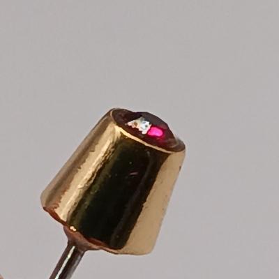 LOT 246: Collection of Faux Garnet and Gold-Tone Fashion Jewelry