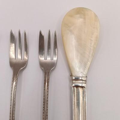 LOT 247: Set of 3 Sterling Silver Henry Kohn & Sons Cocktail Forks 40.32gtw with an Unmarked Silverplate and Shell Spoon