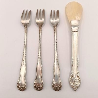 LOT 247: Set of 3 Sterling Silver Henry Kohn & Sons Cocktail Forks 40.32gtw with an Unmarked Silverplate and Shell Spoon