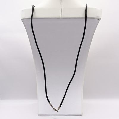 LOT 254: Baltic Amber and Sterling 2" Pendant on Silk Cord with Sterling and Amber Earrings