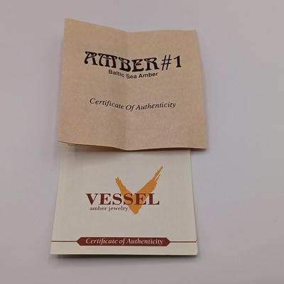 LOT 254: Baltic Amber and Sterling 2" Pendant on Silk Cord with Sterling and Amber Earrings