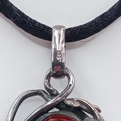 LOT 254: Baltic Amber and Sterling 2" Pendant on Silk Cord with Sterling and Amber Earrings