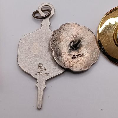 LOT 257: Etienne Aigner Designer Pen, Philadelphia Gas Works Sterling Pendant and Pin, World's Fair Ford Motor Clip & More