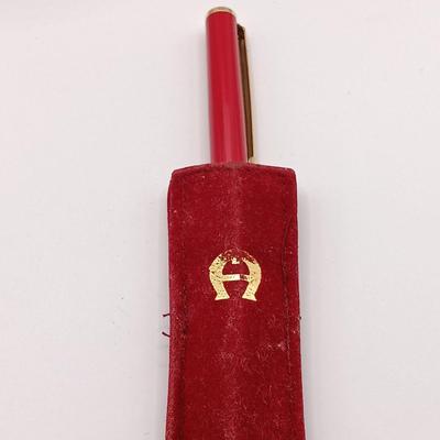 LOT 257: Etienne Aigner Designer Pen, Philadelphia Gas Works Sterling Pendant and Pin, World's Fair Ford Motor Clip & More