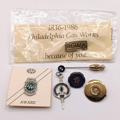 LOT 257: Etienne Aigner Designer Pen, Philadelphia Gas Works Sterling Pendant and Pin, World's Fair Ford Motor Clip & More