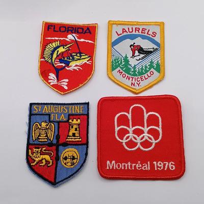 LOT 257: Etienne Aigner Designer Pen, Philadelphia Gas Works Sterling Pendant and Pin, World's Fair Ford Motor Clip & More