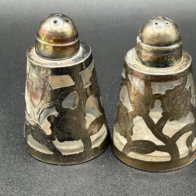 LOT 125K: Weighted Sterling Silver Candlesticks and Sterling Over Glass Bottle and Salt and Pepper Shakers