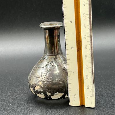 LOT 125K: Weighted Sterling Silver Candlesticks and Sterling Over Glass Bottle and Salt and Pepper Shakers