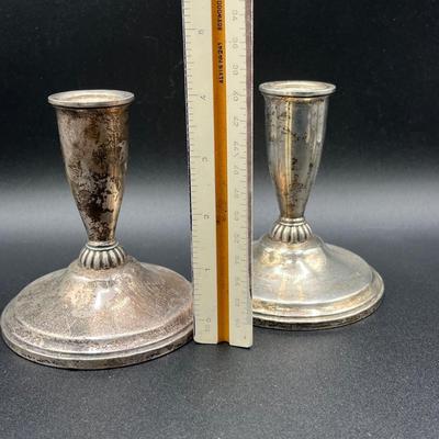 LOT 125K: Weighted Sterling Silver Candlesticks and Sterling Over Glass Bottle and Salt and Pepper Shakers
