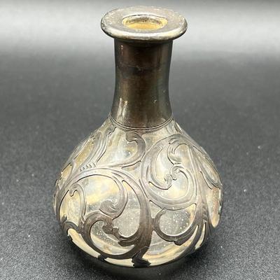 LOT 125K: Weighted Sterling Silver Candlesticks and Sterling Over Glass Bottle and Salt and Pepper Shakers