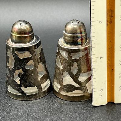 LOT 125K: Weighted Sterling Silver Candlesticks and Sterling Over Glass Bottle and Salt and Pepper Shakers