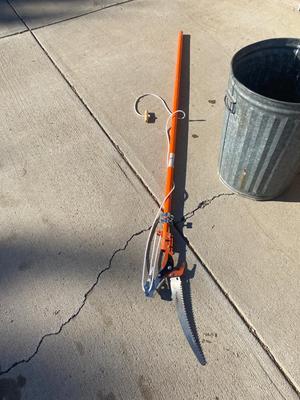 LIKE NEW POLE/TREE SAW AND METAL TRASH CAN