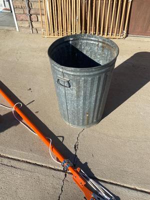 LIKE NEW POLE/TREE SAW AND METAL TRASH CAN