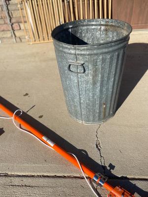 LIKE NEW POLE/TREE SAW AND METAL TRASH CAN