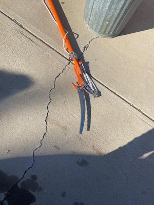 LIKE NEW POLE/TREE SAW AND METAL TRASH CAN