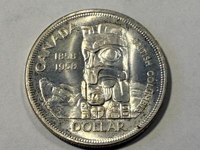 1958 Elizabeth II Canadian Totem Pole Silver Dollar (British Columbia) in Choice BU Condition as Pictured. FREE DOMESTIC SHIPPING.
