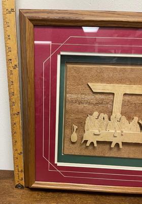 Sale Photo Thumbnail #264: Framed size approx. 22.5" x 19". Similar to a shadow-box, has 4 layers of intricately cut wood creating a 3-D image of the last supper. Framed, matted and behind clear plexiglass.