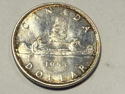 1953 Canada Silver Dollar with Shoulder Straps in Choice Brilliant Uncirculated as Pic'd. FREE DOMESTIC SHIPPING.