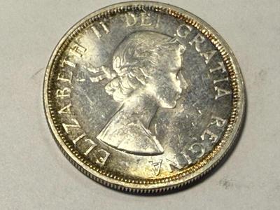 1953 Canada Silver Dollar with Shoulder Straps in Choice Brilliant Uncirculated as Pic'd. FREE DOMESTIC SHIPPING.