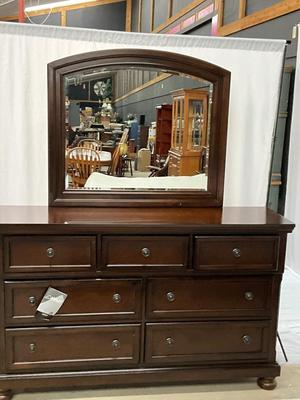 Lot P 634 Porter Rustic Brown Seven Drawer Dresser with Beveled Mirror