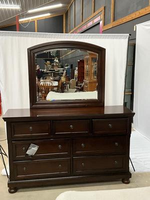 Lot P 634 Porter Rustic Brown Seven Drawer Dresser with Beveled Mirror