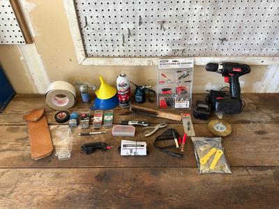 CORDLESS DRILL AND A VARIETY OF USEFUL ITEMS