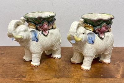 Sale Photo Thumbnail #298: Hand painted, crackle finish, from Japan.  Good condition except that one elephant has a chip in the rear of the green planter basket, see photos. Approx. 7" tall and 8" long.