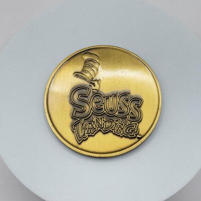 LOT 115J: 1999 Universal Studios Islands of Adventure Seuss Landings Cat in the Hat Coin Medallion in Original Box