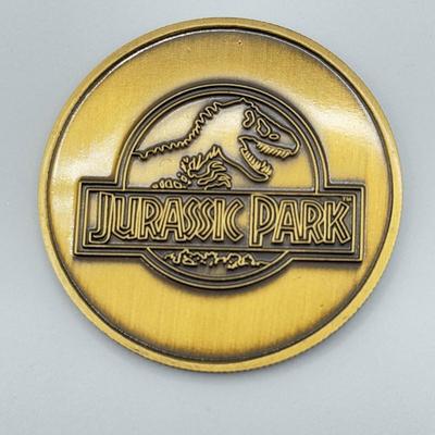LOT 116J: 1999 Universal Studios Islands of Adventure Jurassic Park Dinosaur Coin Medallion in Original Box