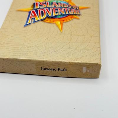 LOT 116J: 1999 Universal Studios Islands of Adventure Jurassic Park Dinosaur Coin Medallion in Original Box