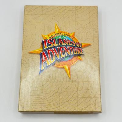 LOT 116J: 1999 Universal Studios Islands of Adventure Jurassic Park Dinosaur Coin Medallion in Original Box