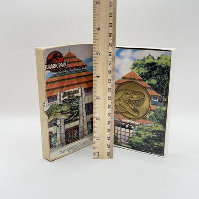 LOT 116J: 1999 Universal Studios Islands of Adventure Jurassic Park Dinosaur Coin Medallion in Original Box