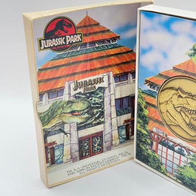 LOT 116J: 1999 Universal Studios Islands of Adventure Jurassic Park Dinosaur Coin Medallion in Original Box
