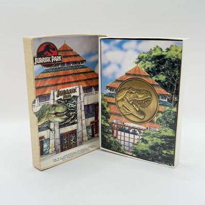 LOT 116J: 1999 Universal Studios Islands of Adventure Jurassic Park Dinosaur Coin Medallion in Original Box