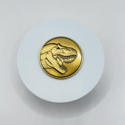 LOT 116J: 1999 Universal Studios Islands of Adventure Jurassic Park Dinosaur Coin Medallion in Original Box