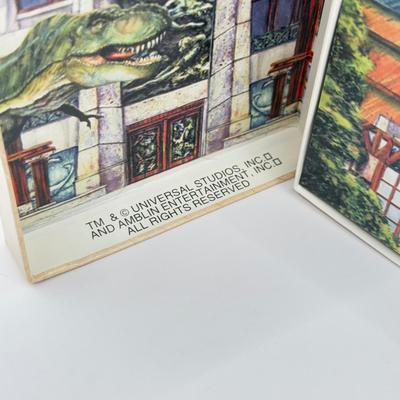 LOT 116J: 1999 Universal Studios Islands of Adventure Jurassic Park Dinosaur Coin Medallion in Original Box