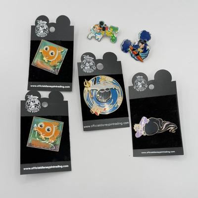 LOT 121K: Disney Trading Pins - Finding Nemo, The Little Mermaid Ursula, Scuba Mickey & Surfing Mickey