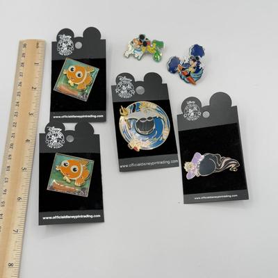 LOT 121K: Disney Trading Pins - Finding Nemo, The Little Mermaid Ursula, Scuba Mickey & Surfing Mickey