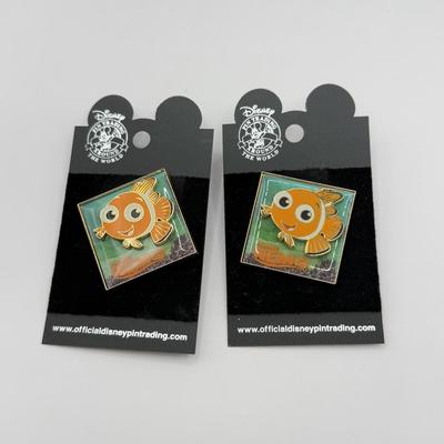 LOT 121K: Disney Trading Pins - Finding Nemo, The Little Mermaid Ursula, Scuba Mickey & Surfing Mickey