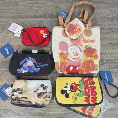 LOT 130B: Disney Bags w/ Tags - Mickey Mouse Wristlets, Eeyore Shoulder Bag, Colorful Roses Mickey Canvas Tote & More