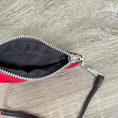 LOT 130B: Disney Bags w/ Tags - Mickey Mouse Wristlets, Eeyore Shoulder Bag, Colorful Roses Mickey Canvas Tote & More